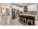 Stylish kitchen with stainless steel appliances, a center island with seating, and plenty of cabinet space at 2139 S Granite St, Gilbert, AZ 85295
