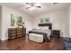 Stylish main bedroom featuring wood floors, modern furniture, and comfortable decor at 2139 S Granite St, Gilbert, AZ 85295
