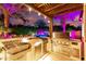 Outdoor kitchen under pergola with stainless steel appliances, sink, and views of the pool at 2139 S Granite St, Gilbert, AZ 85295