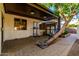 Covered patio with brick pavers, creating a comfortable outdoor space for relaxation and recreation at 2139 S Granite St, Gilbert, AZ 85295