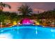 Lush backyard featuring a sparkling pool with built-in spa and water feature at 2139 S Granite St, Gilbert, AZ 85295