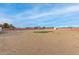 Spacious backyard with putting green, perfect for recreation and leisure at 22312 W Hammond Dr, Buckeye, AZ 85326