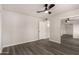 Bedroom boasts ample natural light and modern ceiling fan, with mirrored closet doors maximizing the sense of space at 22312 W Hammond Dr, Buckeye, AZ 85326