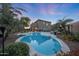 Stunning backyard oasis with a beautiful pool, spa, and covered patio perfect for entertaining at 29966 N 72Nd Dr, Peoria, AZ 85383