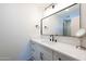 Stylish bathroom featuring a large mirror and modern fixtures at 3029 E Elm St, Phoenix, AZ 85016