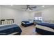 Shared bedroom with three twin beds and natural light at 3029 E Elm St, Phoenix, AZ 85016