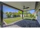Relaxing covered patio with view to a large grassy backyard area at 3029 E Elm St, Phoenix, AZ 85016