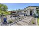 Inviting front patio with comfortable seating and stylish landscaping with pavers and plants at 3029 E Elm St, Phoenix, AZ 85016