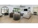 Inviting living room with a ceiling fan, comfortable seating, and built-in shelving at 3029 E Elm St, Phoenix, AZ 85016