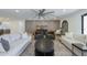 Spacious living room features stylish furniture and a decorative ceiling fan at 3029 E Elm St, Phoenix, AZ 85016