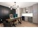 Well-appointed home office with custom cabinets, a wine cooler, and modern lighting at 3029 E Elm St, Phoenix, AZ 85016