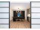 Modern office space with a rustic desk, modern lighting, and stylish storage at 3029 E Elm St, Phoenix, AZ 85016