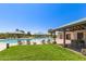 Resort-style pool with lounge chairs and shaded seating, ideal for relaxing and enjoying the community amenities at 30587 N Maple Chase Dr, San Tan Valley, AZ 85143