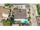 Aerial view of the home's roof, backyard pool, patio, landscaping, and surrounding neighborhood at 3131 E Las Rocas Dr, Phoenix, AZ 85028