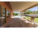 Relaxing covered patio overlooking the private backyard pool at 3131 E Las Rocas Dr, Phoenix, AZ 85028