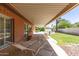 Spacious patio with views of the pool and lush landscaping at 3131 E Las Rocas Dr, Phoenix, AZ 85028