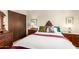 Well-lit bedroom featuring antique furniture and decor at 3131 E Las Rocas Dr, Phoenix, AZ 85028