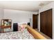 Neutral bedroom with a vintage vanity and closet at 3131 E Las Rocas Dr, Phoenix, AZ 85028