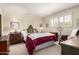 Comfortable bedroom with shuttered windows and vintage furnishings at 3131 E Las Rocas Dr, Phoenix, AZ 85028