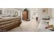 Spacious bedroom offering carpeted floors and a view into the en suite bathroom at 3131 E Las Rocas Dr, Phoenix, AZ 85028
