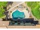 Overhead view of backyard featuring pool and desert landscaping at 32901 N Hidden Canyon Dr, San Tan Valley, AZ 85144