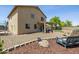Large backyard with desert landscaping and comfortable seating area at 32901 N Hidden Canyon Dr, San Tan Valley, AZ 85144