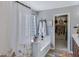 Bathroom with tub/shower combination and access to a large closet at 32901 N Hidden Canyon Dr, San Tan Valley, AZ 85144