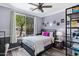 Cozy bedroom with a large window and a comfortable bed at 32901 N Hidden Canyon Dr, San Tan Valley, AZ 85144