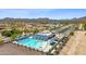 Aerial view of San Tan Heights Community Center's large community pool and surrounding desert landscape at 32901 N Hidden Canyon Dr, San Tan Valley, AZ 85144