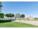 Beautiful park featuring a volleyball court, picnic tables, and lush grass at 32901 N Hidden Canyon Dr, San Tan Valley, AZ 85144