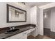 Bathroom with granite countertop, undermount sink, and custom wood cabinetry at 3302 N 7Th St # 344, Phoenix, AZ 85014