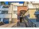 Multi-level building featuring brick accents, individual garages, and well-maintained landscaping at 3302 N 7Th St # 344, Phoenix, AZ 85014