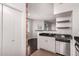 Modern kitchen featuring sleek appliances and a breakfast bar for casual dining at 3302 N 7Th St # 344, Phoenix, AZ 85014