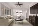 Staged living room with modern furniture, creating a comfortable and inviting atmosphere at 3302 N 7Th St # 344, Phoenix, AZ 85014