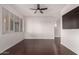 Empty living room with hardwood floors and modern fixtures offering a clean aesthetic at 3302 N 7Th St # 344, Phoenix, AZ 85014