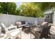 Inviting backyard offering multiple seating areas and lush landscaping for outdoor enjoyment at 338 W Encanto Blvd, Phoenix, AZ 85003