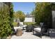 Relaxing backyard setting with a fire pit and comfortable seating, ideal for gatherings at 338 W Encanto Blvd, Phoenix, AZ 85003
