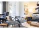 Stylish living space featuring designer seating, recessed shelving, and modern accents at 338 W Encanto Blvd, Phoenix, AZ 85003