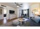 Bright living space with contemporary furnishings and an adjacent dining area at 338 W Encanto Blvd, Phoenix, AZ 85003