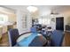 Open-concept living space with modern furnishings, seamlessly connecting the kitchen, dining, and living areas at 338 W Encanto Blvd, Phoenix, AZ 85003