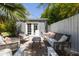 Inviting backyard patio with seating and outdoor lights, perfect for relaxing and entertaining at 338 W Encanto Blvd, Phoenix, AZ 85003