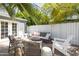 Cozy patio space featuring a comfortable lounge area surrounded by lush landscaping at 338 W Encanto Blvd, Phoenix, AZ 85003