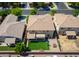 This aerial shot shows a home's backyard with artificial turf and convenient patio, surrounded by neighboring properties at 3788 E Sexton St, Gilbert, AZ 85295