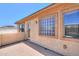 Outdoor balcony with textured walls and view of exterior windows and doors at 3788 E Sexton St, Gilbert, AZ 85295