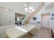 Spacious dining area with tile floors, large windows and staircase at 3788 E Sexton St, Gilbert, AZ 85295