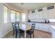 Dining area with a table and views of the kitchen at 3788 E Sexton St, Gilbert, AZ 85295