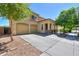 Inviting home with a two-car garage, a welcoming porch, and desert landscaping at 3788 E Sexton St, Gilbert, AZ 85295