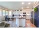 Bright kitchen with stainless steel appliances and an island with a sink at 3788 E Sexton St, Gilbert, AZ 85295
