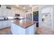 Spacious kitchen featuring stainless steel appliances, island with sink, and granite countertops at 3788 E Sexton St, Gilbert, AZ 85295