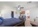 Bright main bedroom features wood-look flooring and an ensuite bathroom at 3788 E Sexton St, Gilbert, AZ 85295